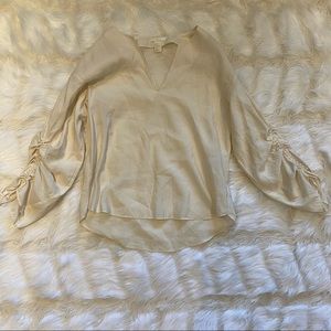 Cream top with balloon sleeves. H&M.